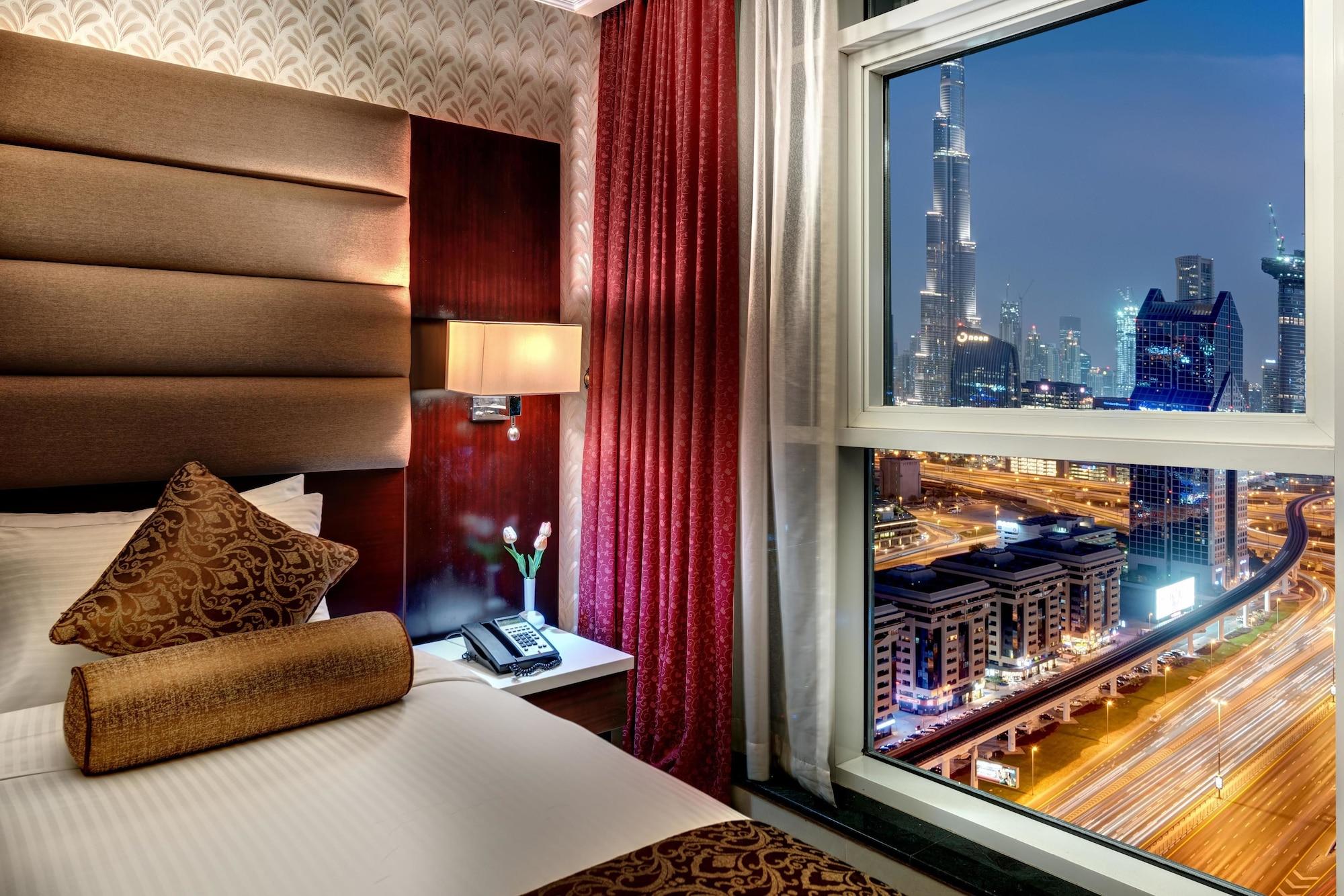 Emirates Grand Hotel Apartamentos Dubái Exterior foto