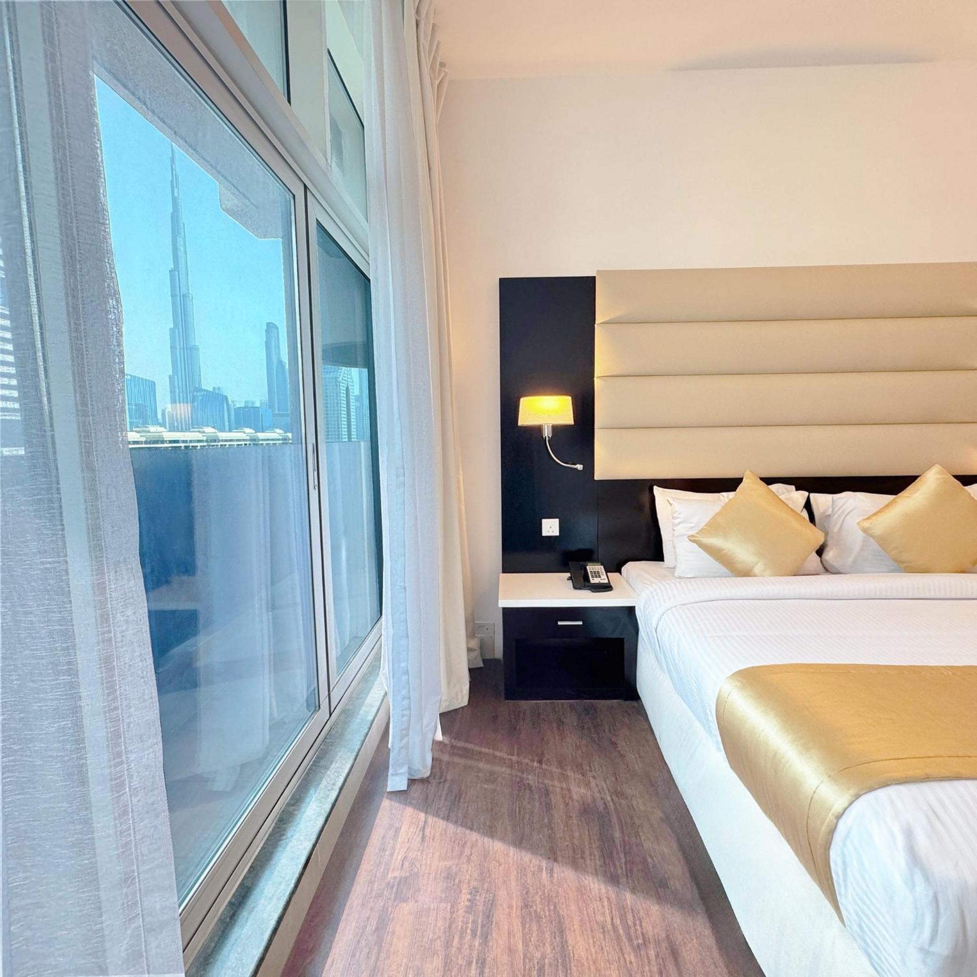 Emirates Grand Hotel Apartamentos Dubái Exterior foto
